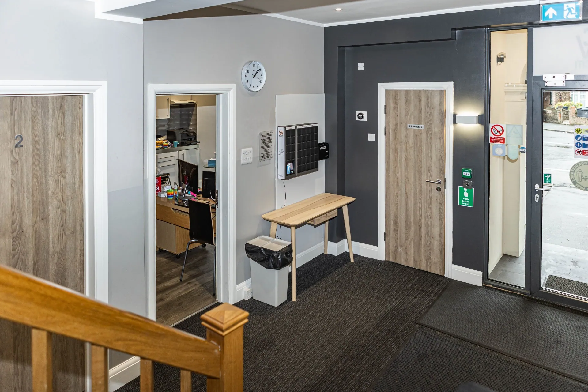 Lobby of a Westciti serviced apartment with SmartBoxes wall-mounted near the entrance