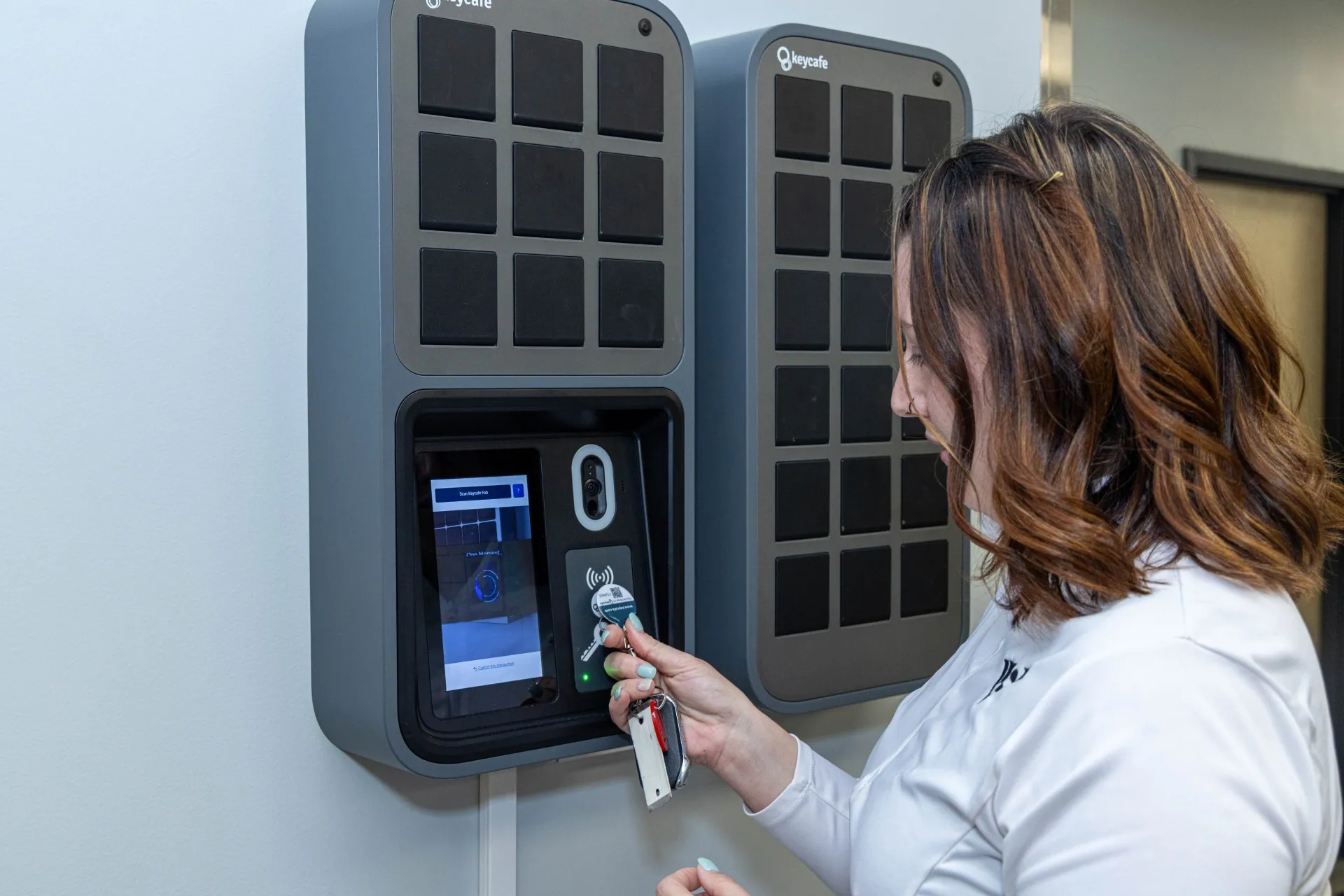 Signarama employee scanning a Keycafe fob at the SmartBox