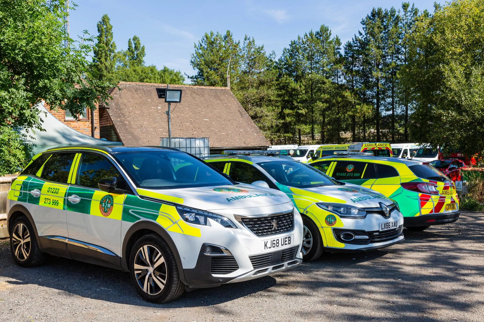 Parking lot with BM Ambulance vehicles