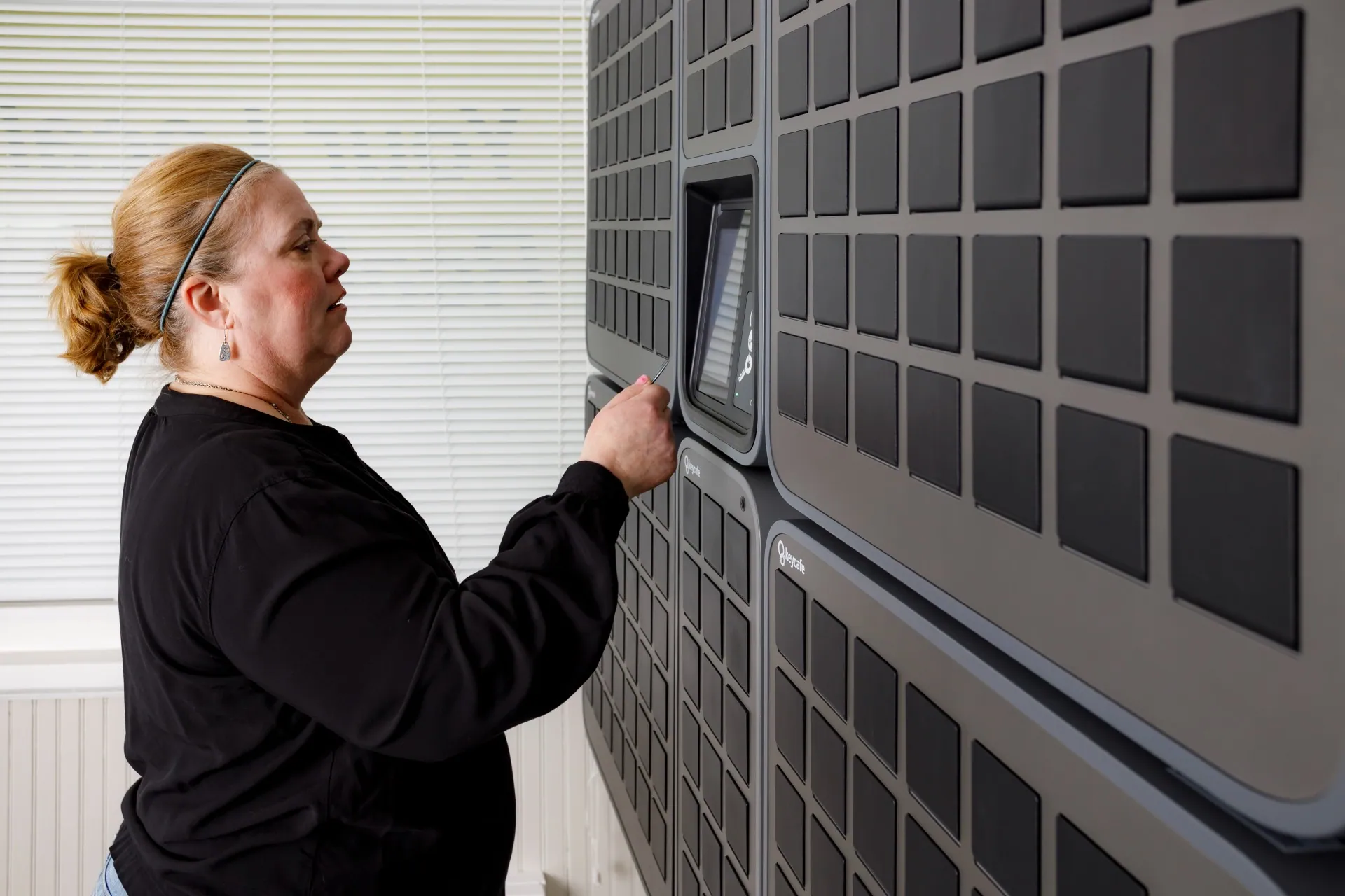 Your Place Property Management employee using a Keycafe SmartBox