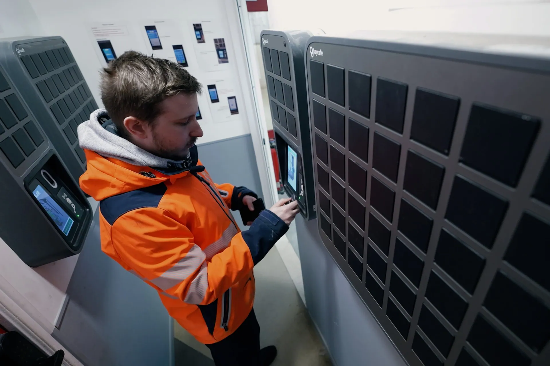 Construction worker in high-vis vest using a SmartBox