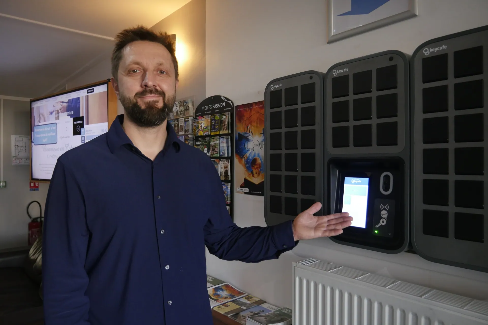 Thomas Cadot standing beside his SmartBoxes