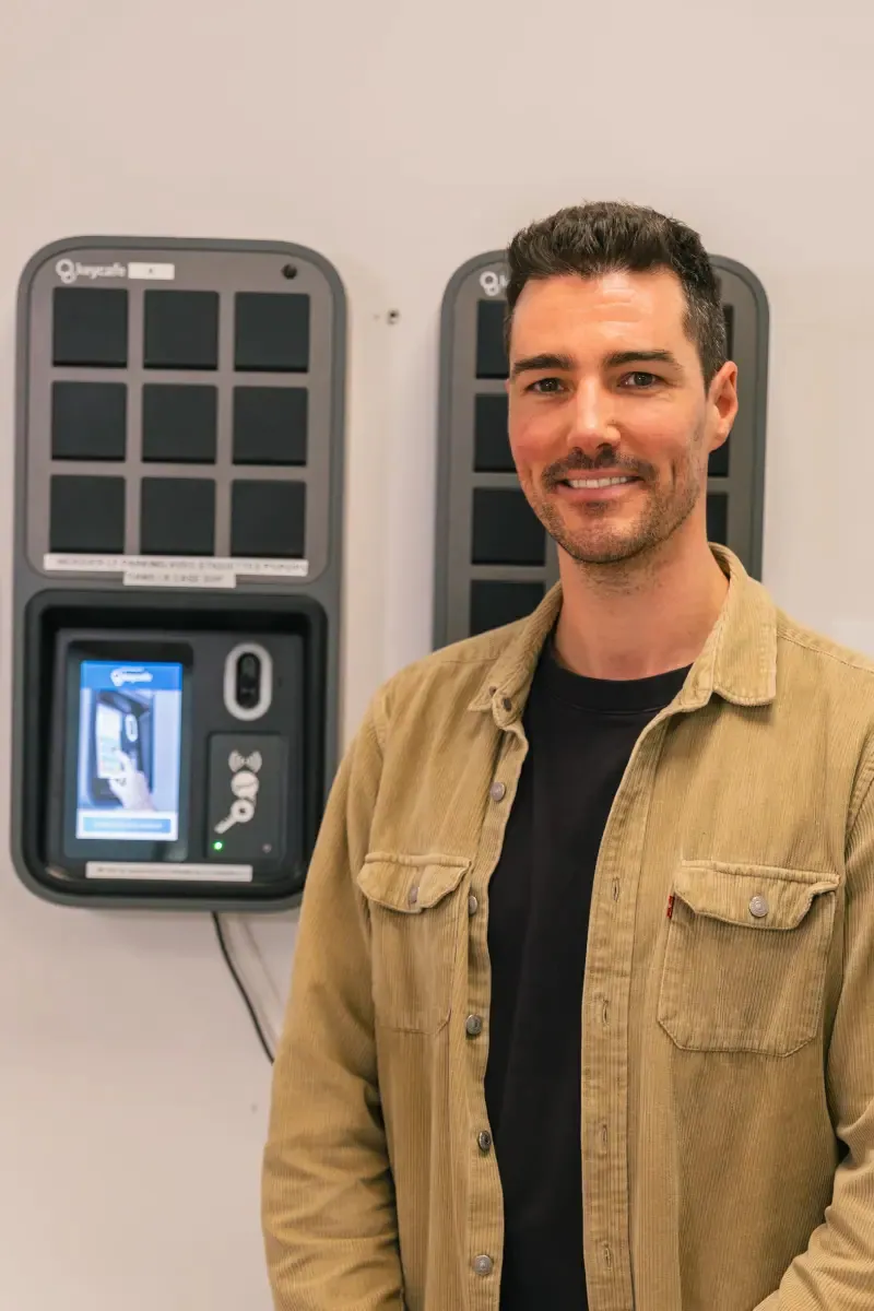 Vincent Prido, Assia UNA's Head of Service, standing in front of his SmartBoxes