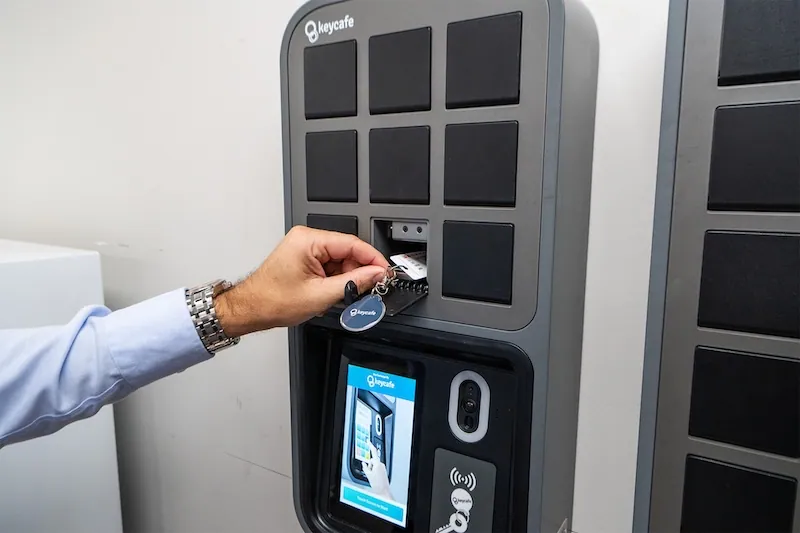 a man picking up keys from the Keycafe Smartbox