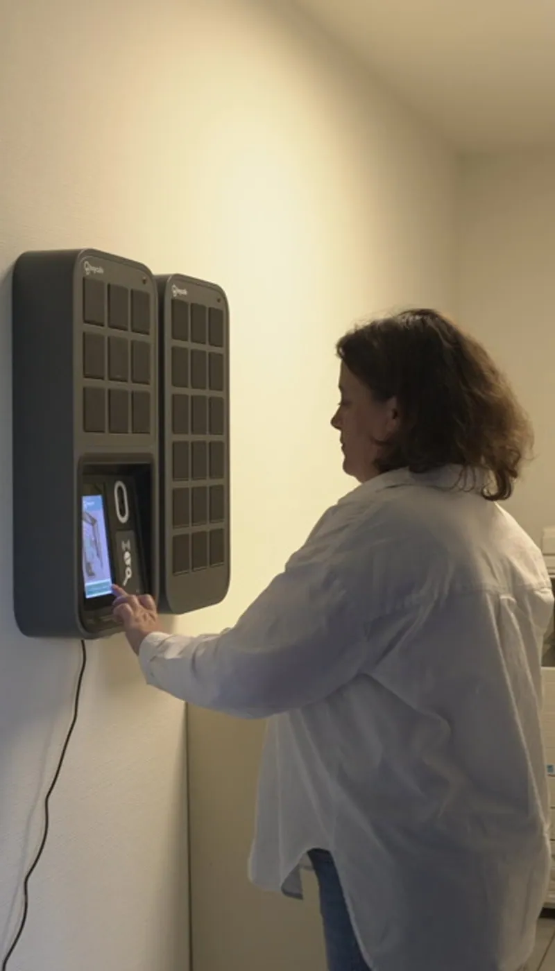 a women using the keycafe smartbox