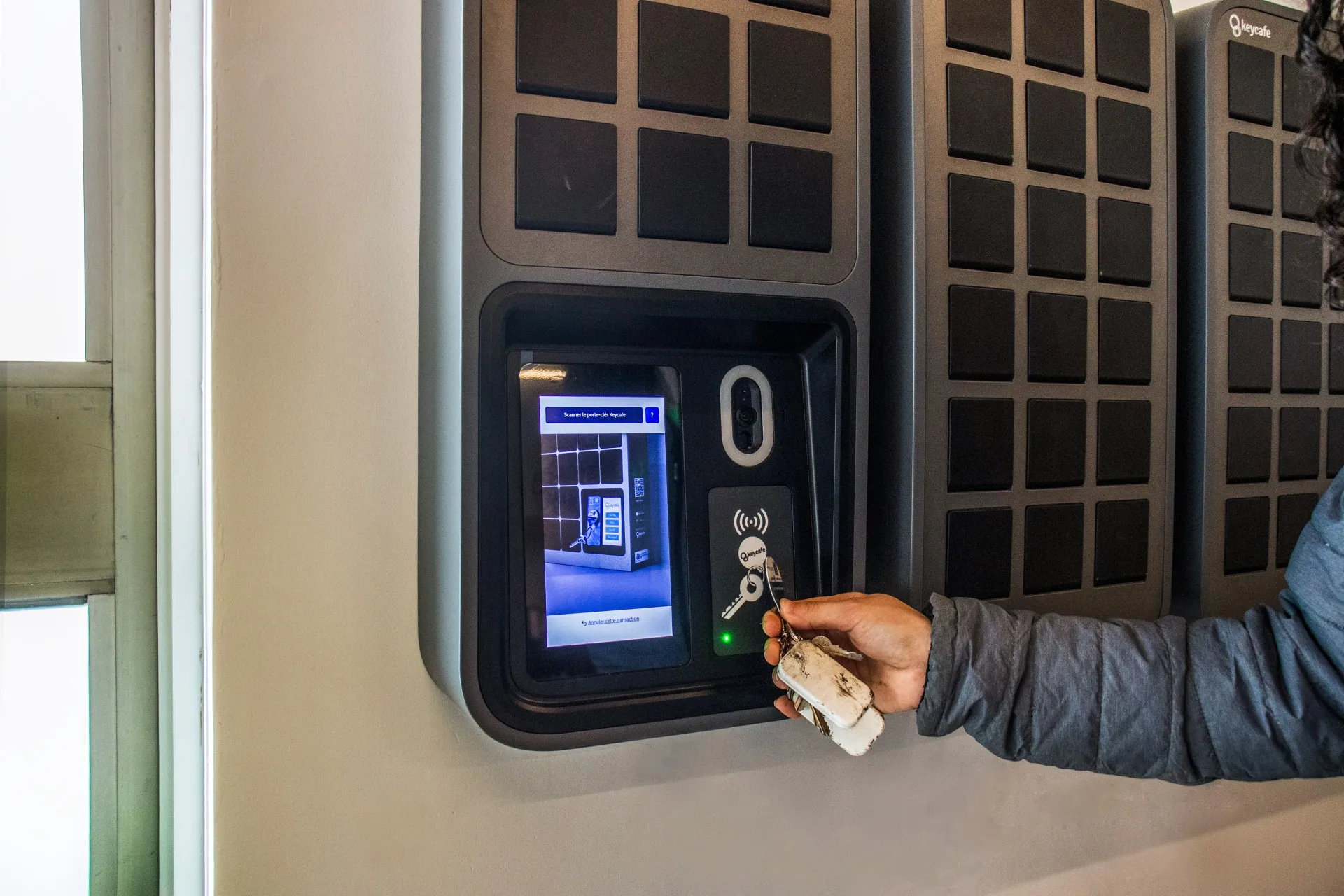 Biotix Environmental Solutions employee scanning a Keycafe fob at the SmartBox