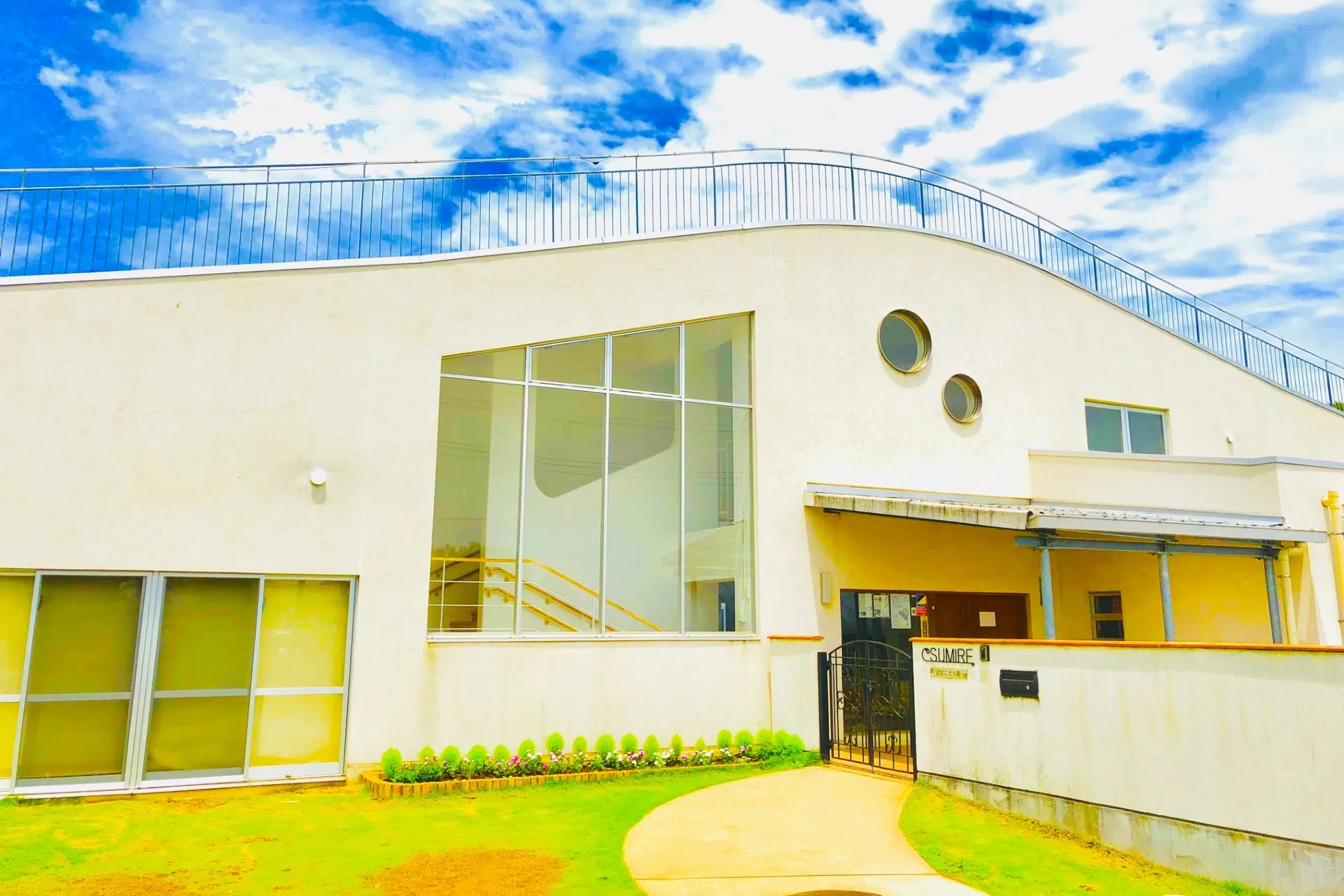 Exterior of a Kindergarten Sumire building with circular windows