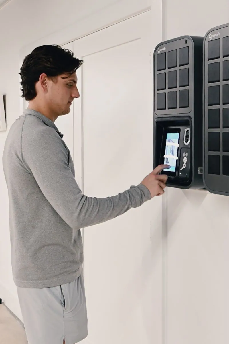 Dealership manager picking up a key