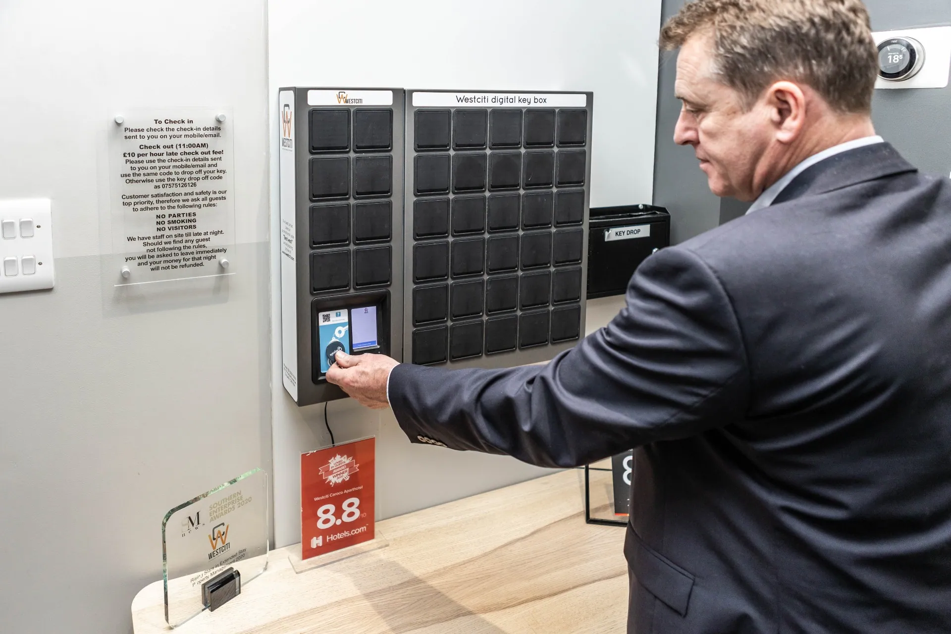 A guest scanning a Keycafe fob at the SmartBox