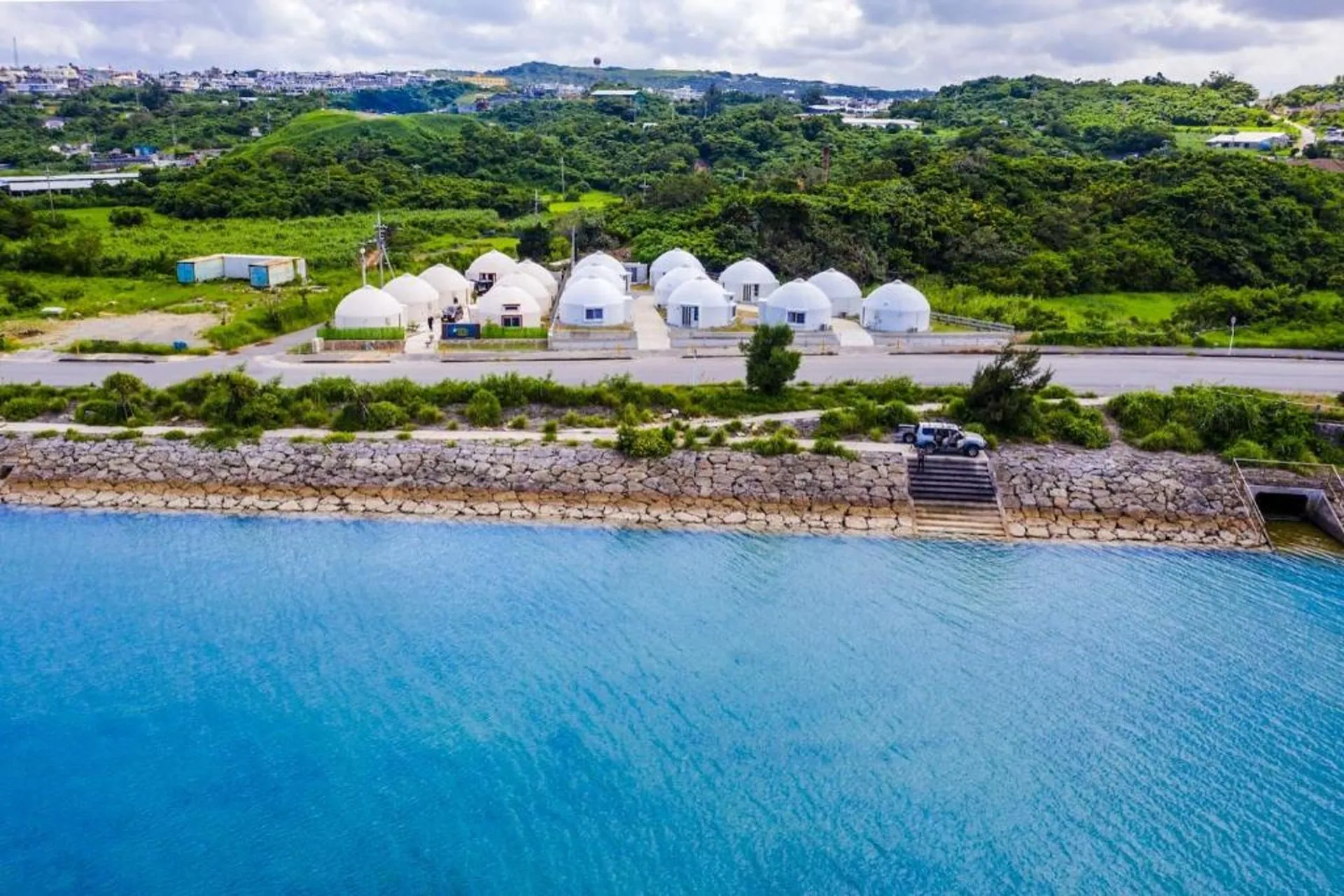 Drone shot of the dome-shaped buildings near the ocean