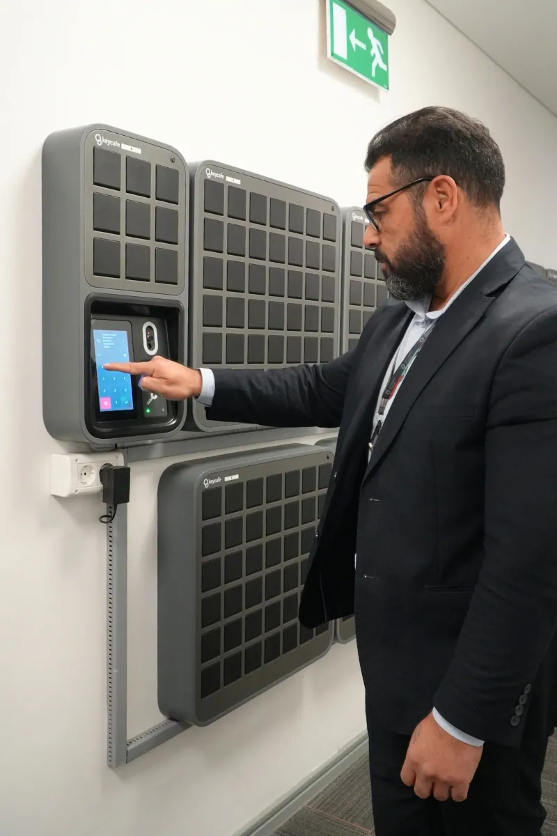 Security personnel using a SmartBox to securely manage airport key