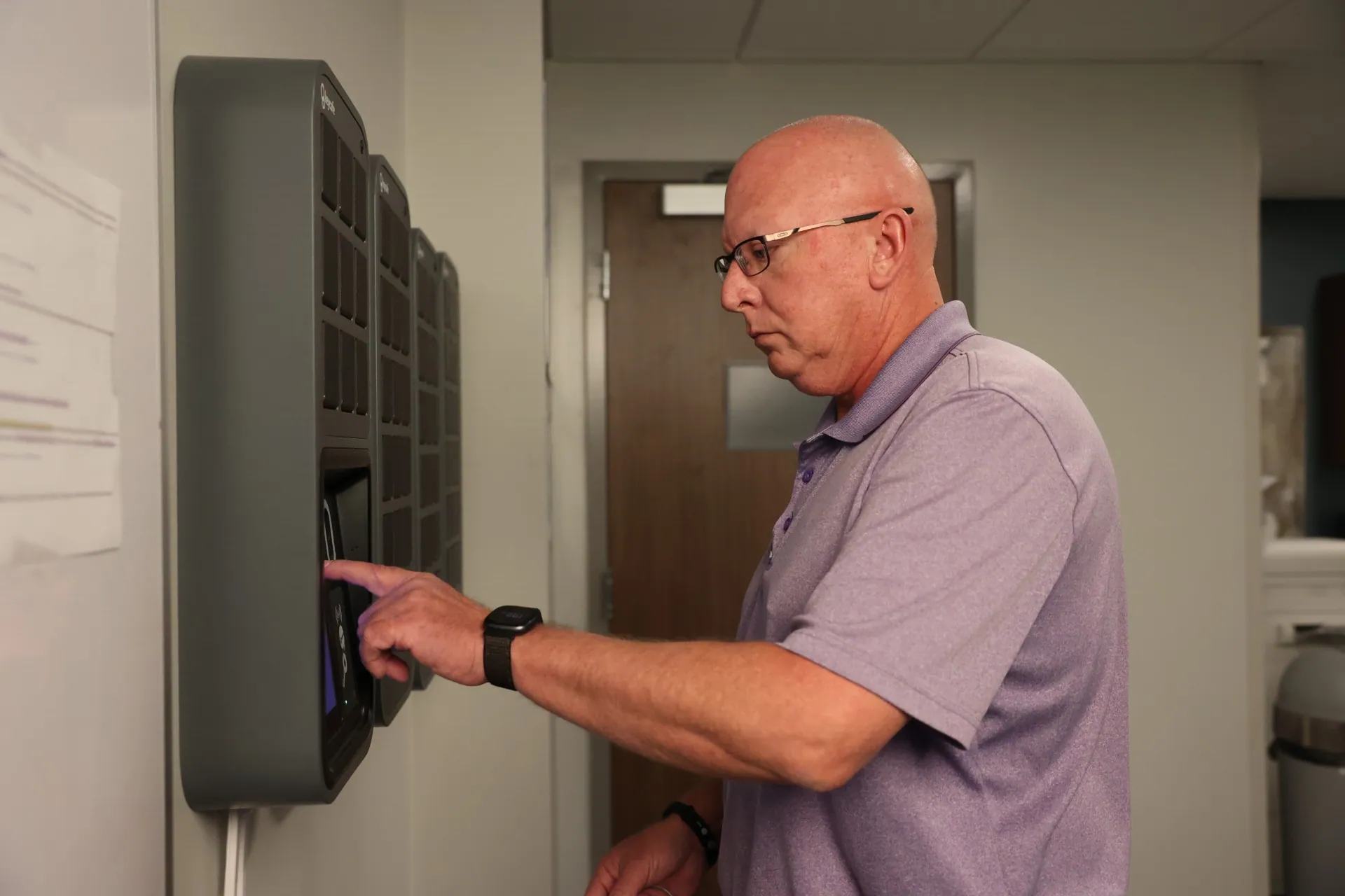 Chief Engineer Kevin Krause tapping the SmartBox screen