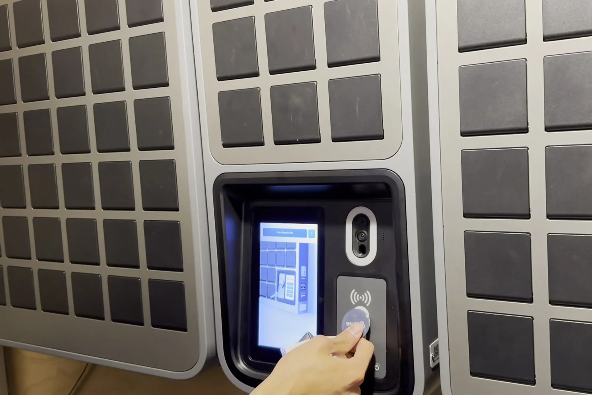 A Zeemac employee scanning a Keycafe fob at the SmartBox