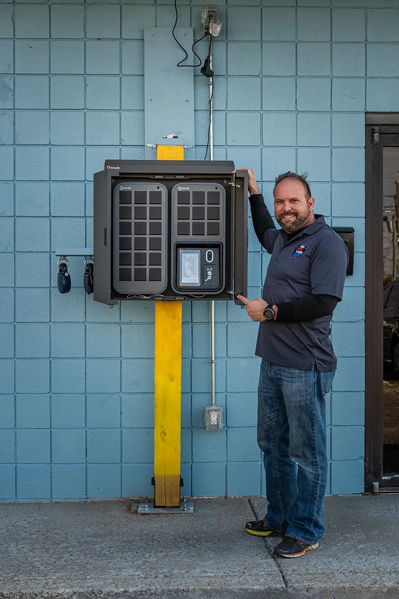 Price is Right Rental COO Joel Price standing next to his SmartBoxes