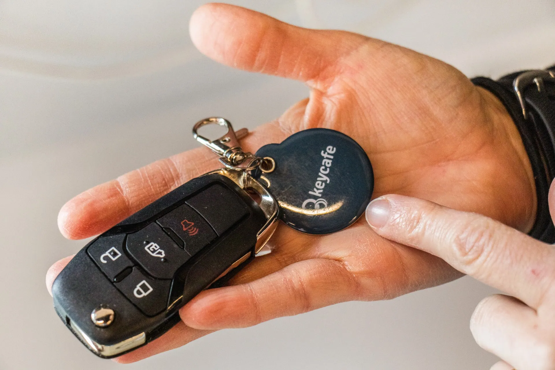 Close up of a Boitix Environmental Solutions vehicle key with an attached Keycafe fob