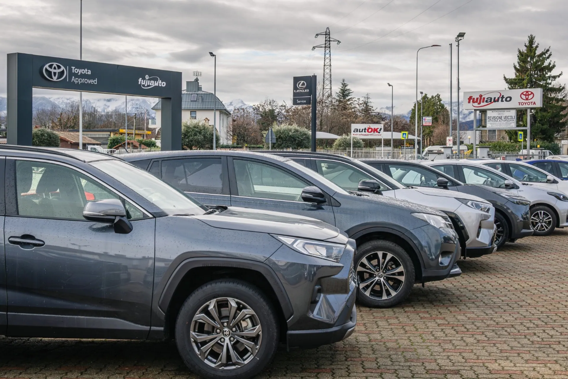 Row of Toyota vehicles on the Fuji Auto lot
