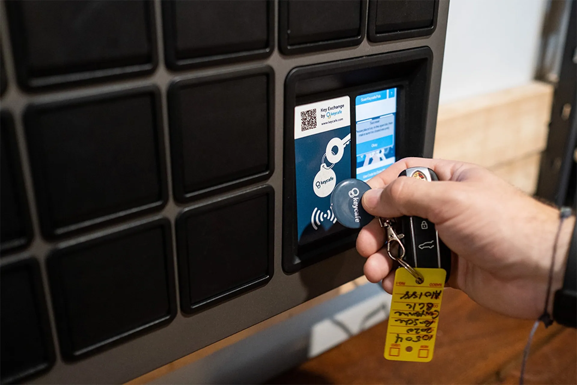 Staff member scanning a Keycafe fob at the SmartBox