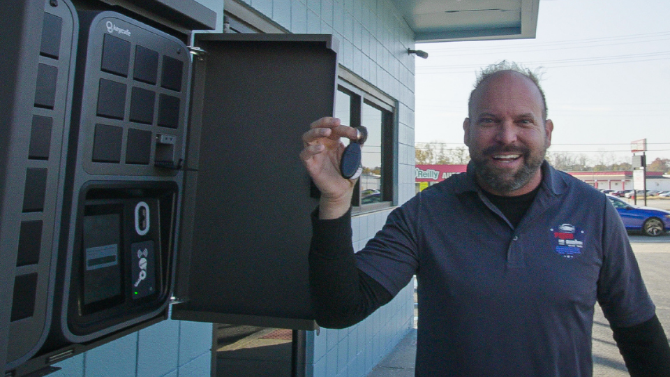 Rental car company manager using Keycafe SmartBox to manage and access vehicle keys efficiently