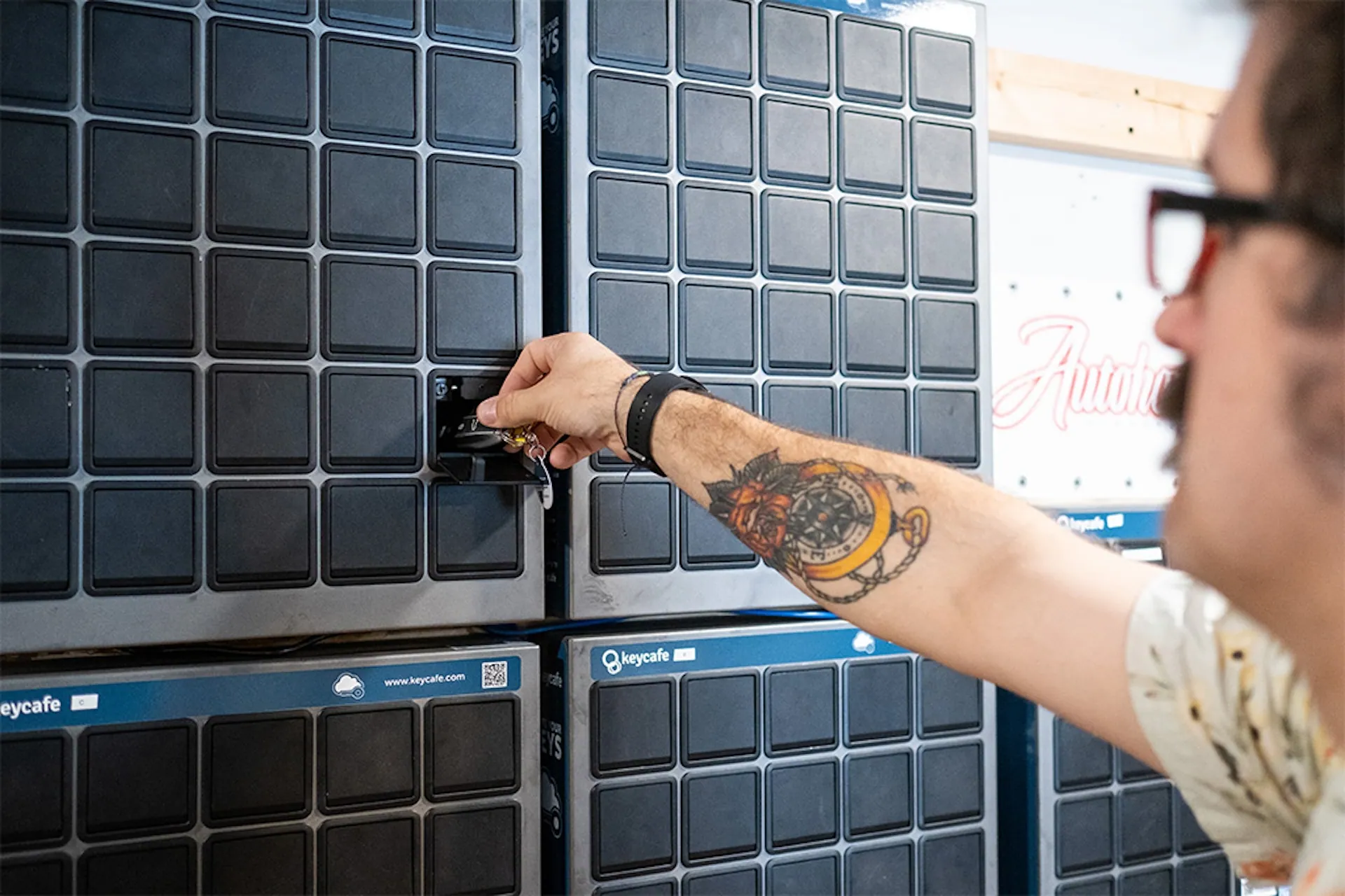 Digital Asset Manager Tyler Burley returning keys to the SmartBox