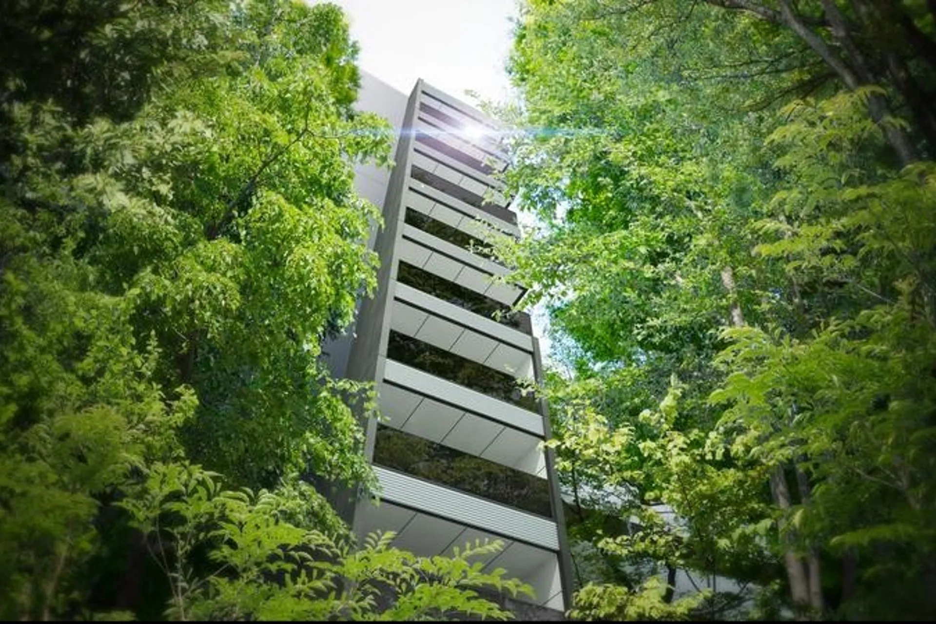 Exterior of a WACLASS building behind trees