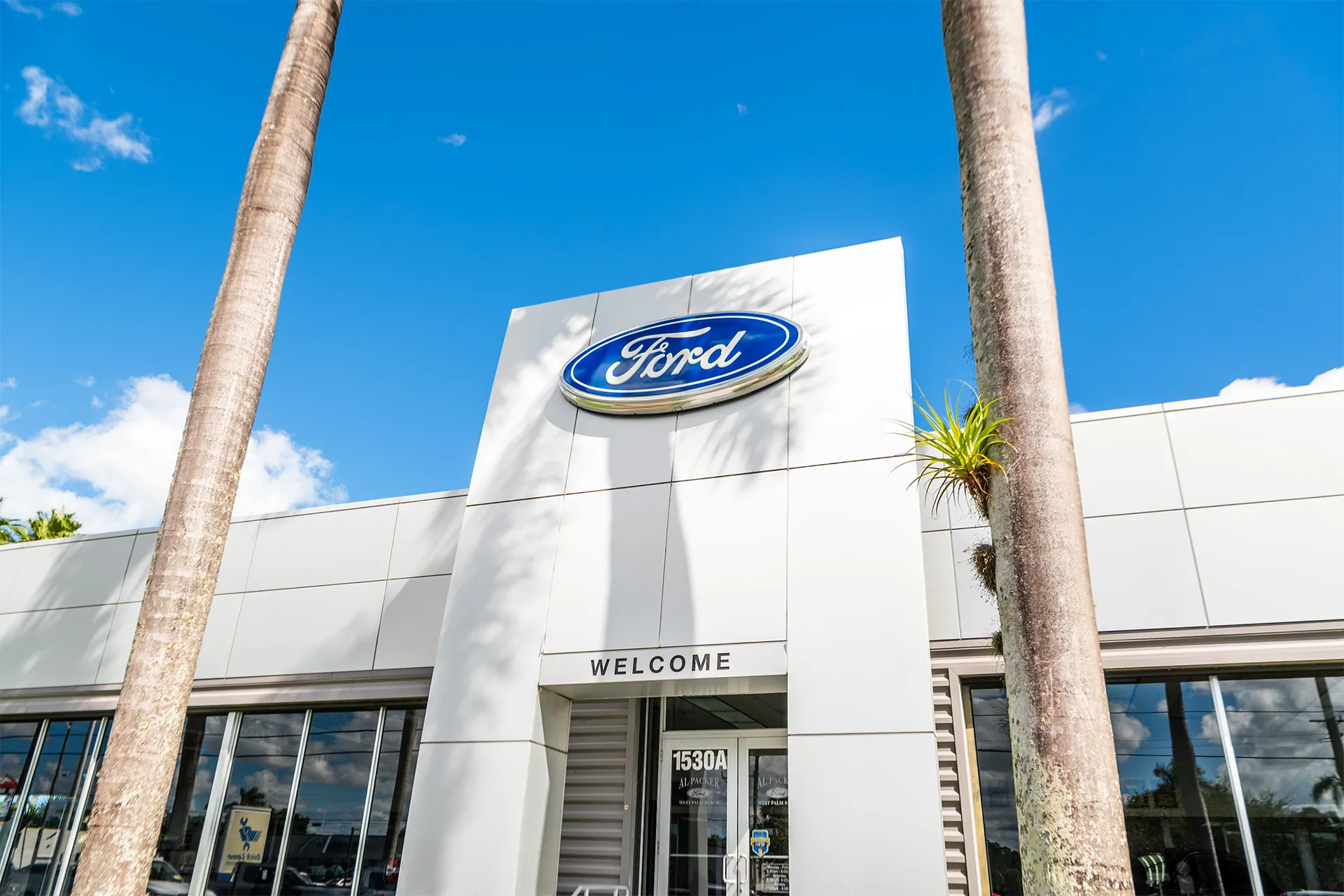 Al Packer Ford building entrance with the Ford logo
