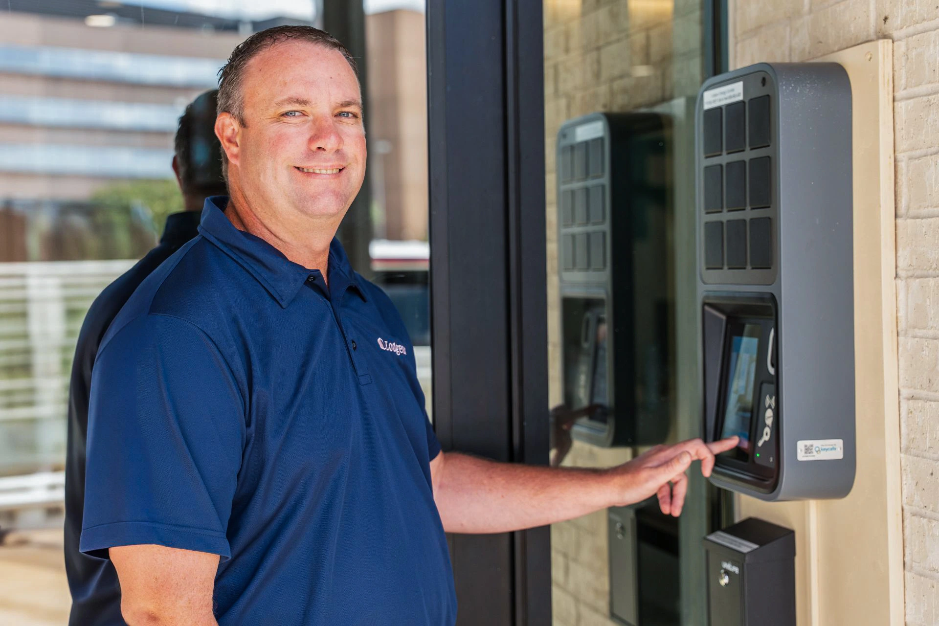 Brad Serey using the SmartBox and smiling