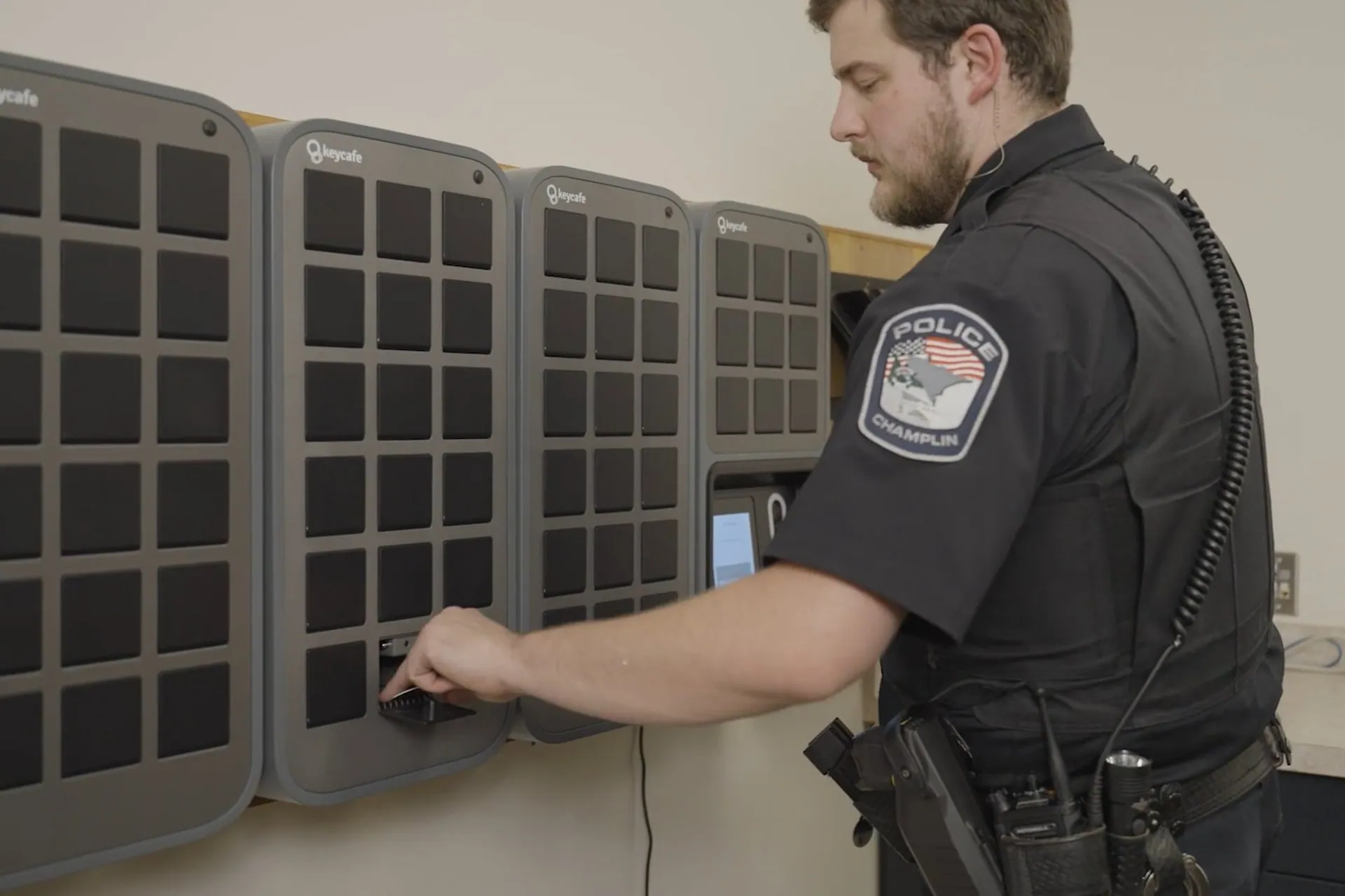 Champlin Police Department officer taking keys from a SmartBox bin